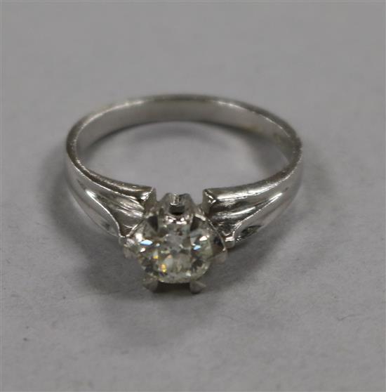 A 14ct white gold and solitaire diamond ring, size K.